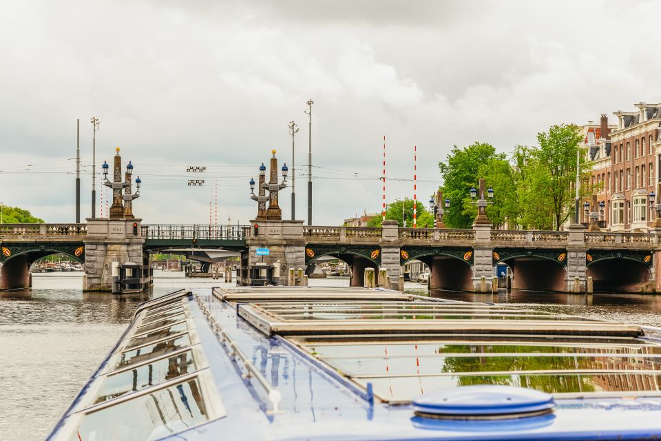 Amsterdam: City Canal Cruise With Audio Guide - Itinerary and Sightseeing Highlights