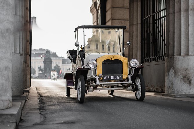 City Sightseeing Tour in an Electro Vintage Car (Up to 5 People) - Meeting Point Details