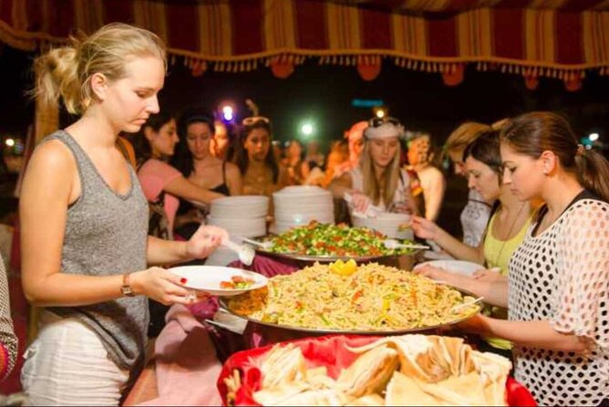 Desert Safari BBQ Dinner, Camel Ride & Sandboarding From Dubai - Pickup and Meeting Point