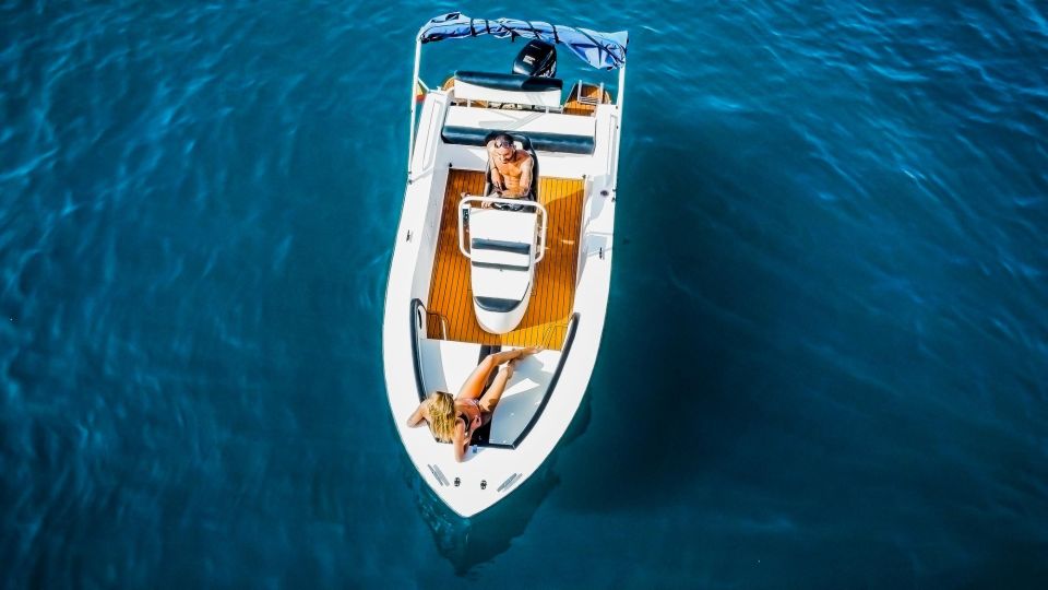 Flow Into the Ocean Without License and Discover Adeje - Included Boat Features