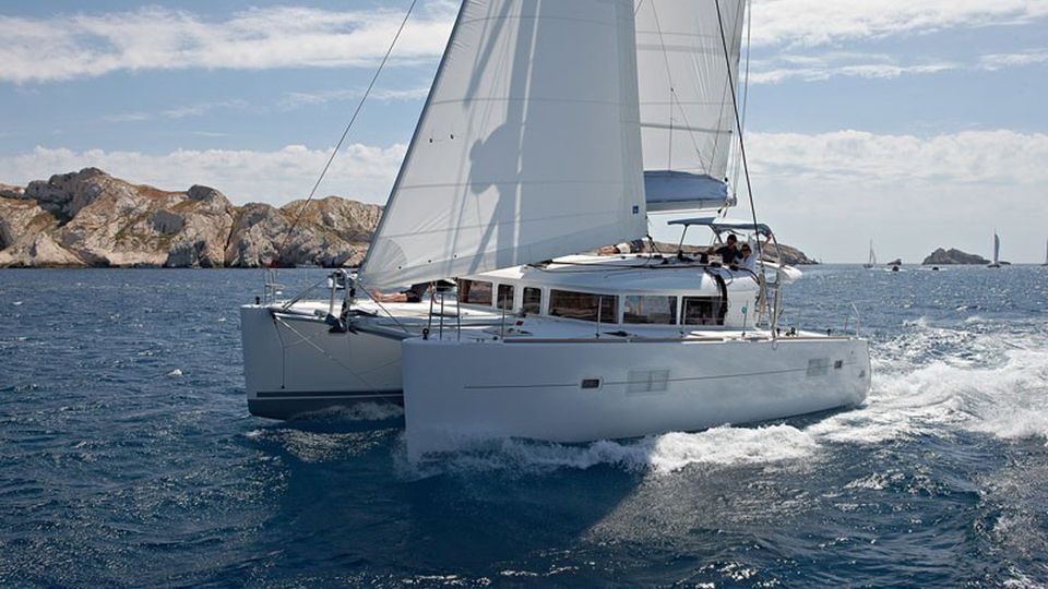 From Ibiza: Espalmador and Formentera Private Catamaran Trip - Snorkeling and Paddleboarding