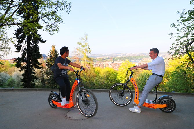 Grand City Tour of Prague on Cruiser E-Bikes or E-Scooters - Engaging Commentary and Stories