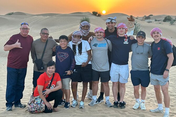 Guided Desert Safari With Dinner and Quad Biking in Dubai - Meeting and Pickup