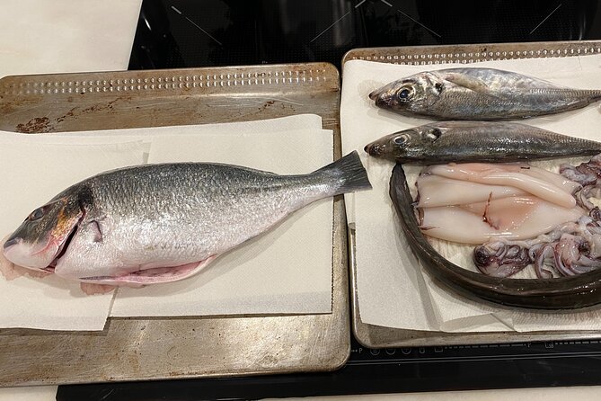 Lisbon Market and Food Tour With Cooking Class and Lunch - Preparing a Fish Dish