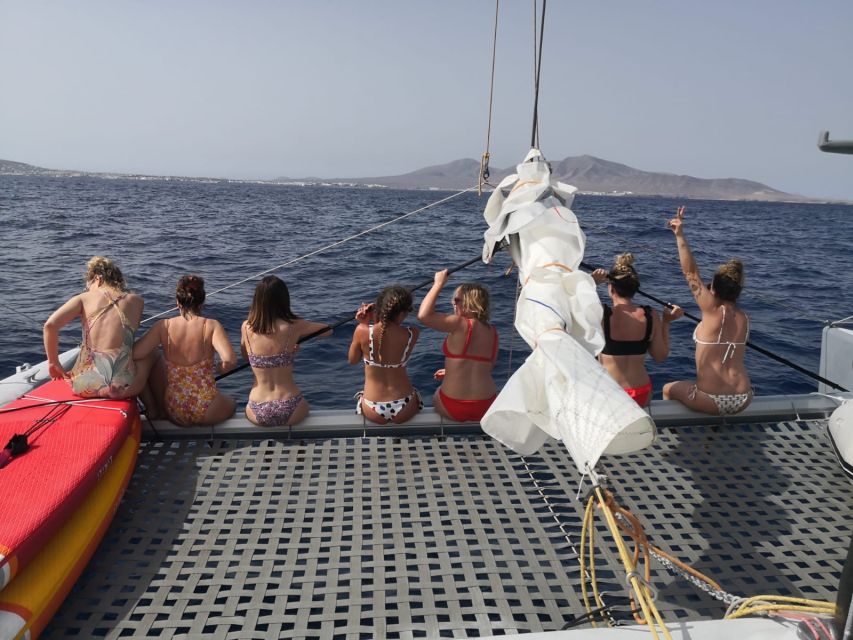 Playa Blanca: Private Catamaran Tour With SUP and Snorkeling - Onboard Catamaran Maneuvers