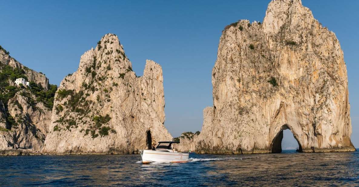 Positano: Boat Tour of Capri With Drinks and Snacks - Boat and Group Size