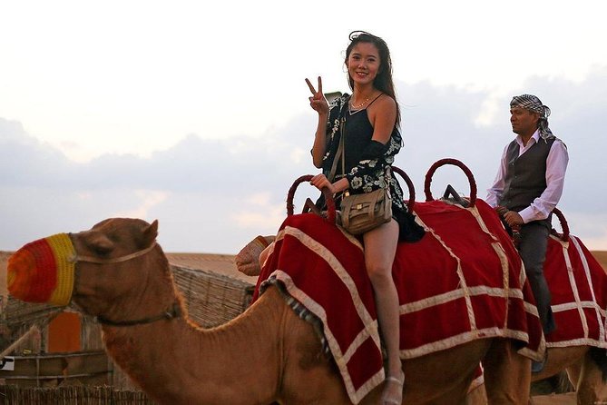 Private Desert Safari, Sand Board, Camel Ride & BBQ Dinner - Transportation Provided