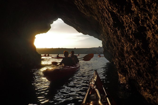 Santorini: Sunset Sea Kayak With Light Dinner - Snorkeling in the Crystalline Waters