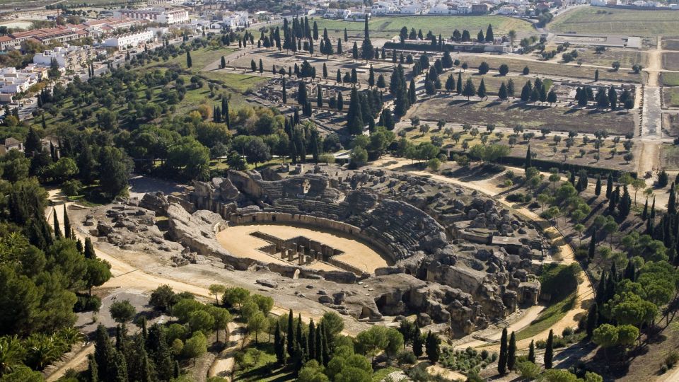 Seville: Private Guided Tour of Italica With Hotel Pickup - Emblematic Sites of Seville Explored