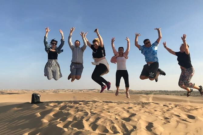 Abu Dhabi Desert Safari With BBQ Dinner & Shows - Sandboarding Adventure