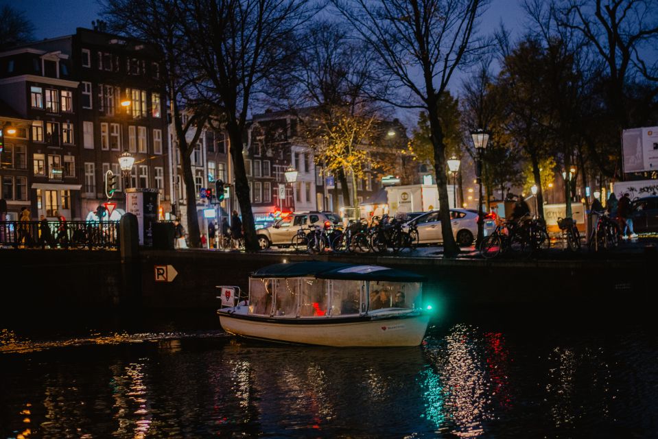 Amsterdam: Private Evening Canal Cruise With Prosecco - Savoring Local Delicacies on Board