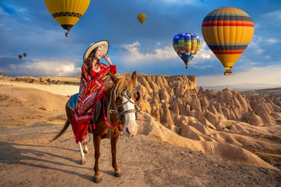 Cappadocia: Horse Riding With Balloons Above at Sunrise - Winding Paths and Rocky Trails