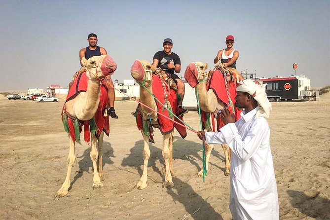 Doha Sunset Safari: Camel Trek With Dune Bashing and Sandboarding - Unique Safari Experiences