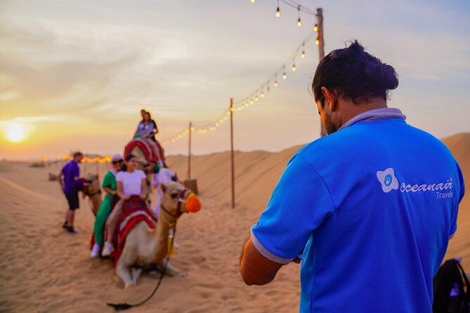 Dubai Red Dunes Desert Safari, Quad Bike, Camel at Al Khayma Camp - Relaxing Camel Riding Tour