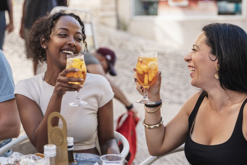 Lisbon Tipsy Food Tour With Drinks and Food Included - Social Interaction and Atmosphere