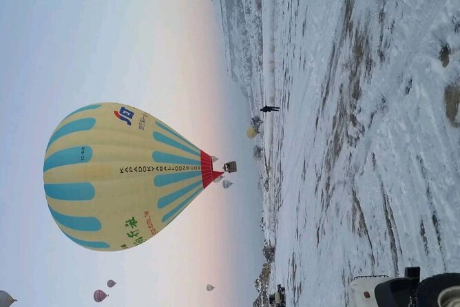 One Hour Cappadocia Hot Air Balloon Tour on Fairy Chimneys - Private Transportation and Pickup