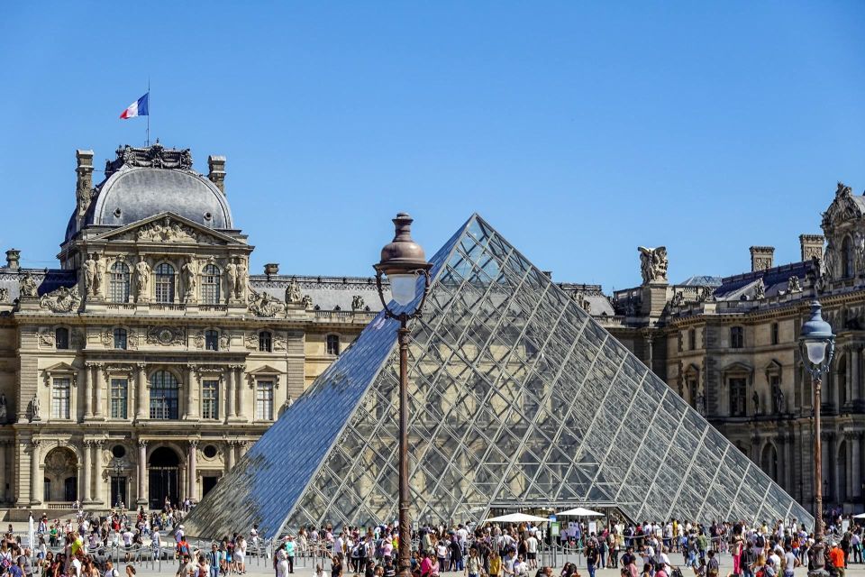 Paris - Louvre Pyramid : The Digital Audio Guide - Connecting With the Louvres Soul