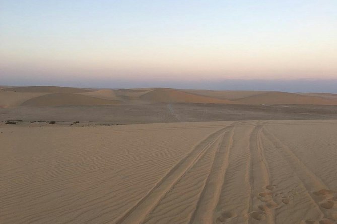 Private Sunrise Desert Safari BashingCamel RideSand BoardingInland Sea Visit. - Booking and Cancellation