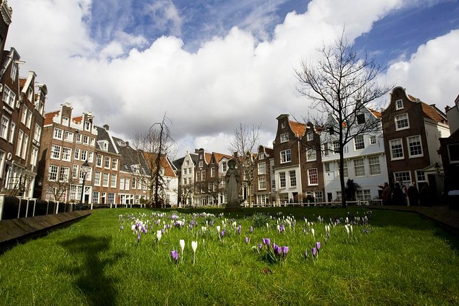 Secrets of Amsterdam Walking Tour Plus Dutch Sweets Tasting - Dutch Treats Sampling at Flower Market