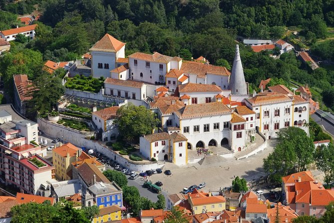 Sintra and Cascais Private Half Day Sightseeing Tour From Lisbon - Exploring Quinta Da Regaleira