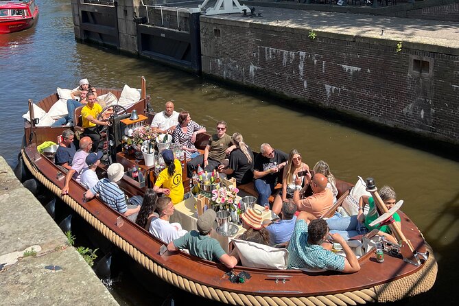 Amsterdam Luxury Boutique Boat Tour With Unlimited Beer and Wine - Accessibility and Accommodations