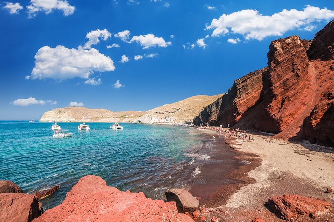 Archaeological Bus Tour to Akrotiri Excavations & Red Beach - Touring Perivolos Beach