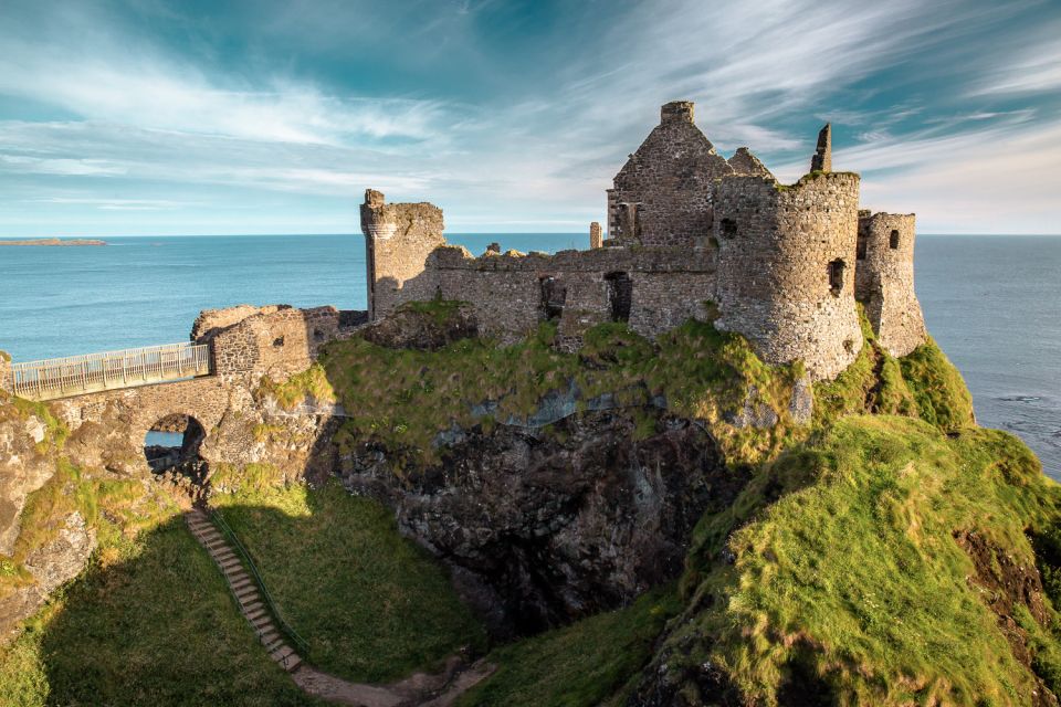 Dublin: Giants Causeway, Dark Hedges, Dunluce & Belfast Tour - Capturing Dunluce Castle