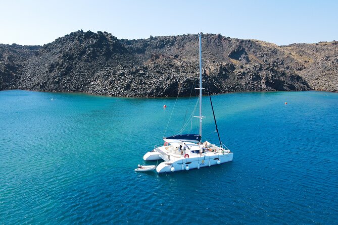 Full Day Santorini Catamaran Private Cruise With Meal and Transfer - Pickup and Meeting Point