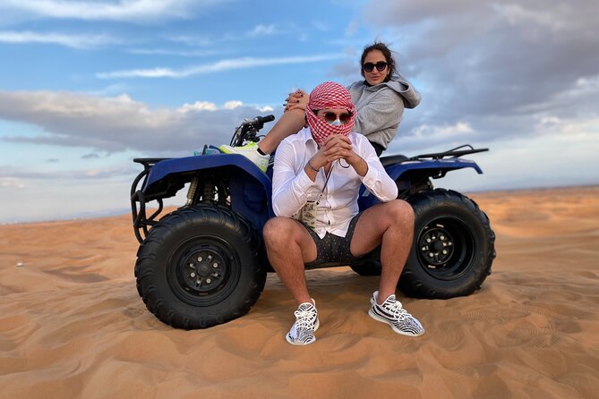 Morning Desert Safari, Quad Bike, Sandboard & Camel Ride - Thrilling Quad Bike Adventure