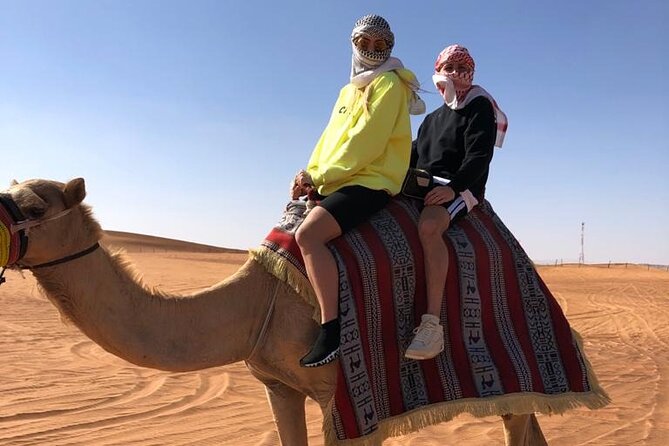 One Hour Quad Bike at Red Sand Desert Safari With Camel Ride and BBQ Dinner - Camel Ride and Cultural Show