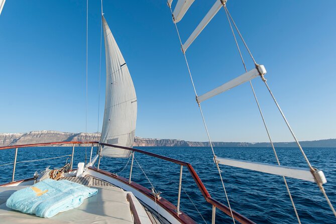 Santorini Caldera Sunset Traditional Cruise With Meal and Drinks - Inclusions and Pickup Details