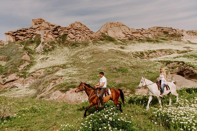 Santorini: Horse Riding to the Black Sandy Beach (Eros Beach) - Helmets and Saddlebags Provided