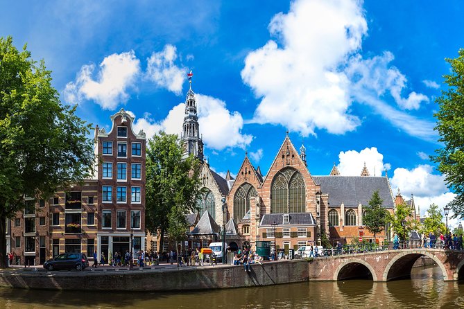 Secrets of Amsterdam Walking Tour Plus Dutch Sweets Tasting - Tour Inclusions and Meeting Details