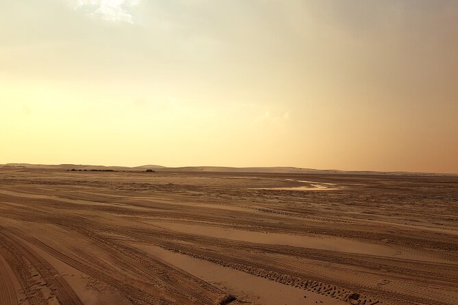 Doha: Private Sunrise or Sunset Desert Safari With Sand Boarding - Sand Boarding Experience