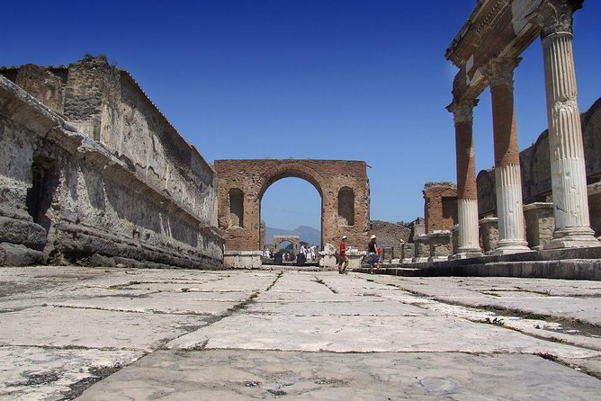 From Naples: Pompeii Shared Tour With Guide and Tickets Included - Exploring Pompeiis Ruins