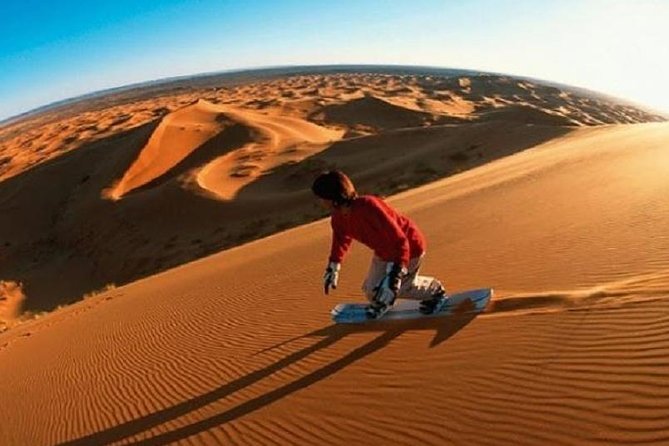 Morning Red Desert Safari With Camel Ride Dubai - Thrilling Sandboarding Activity