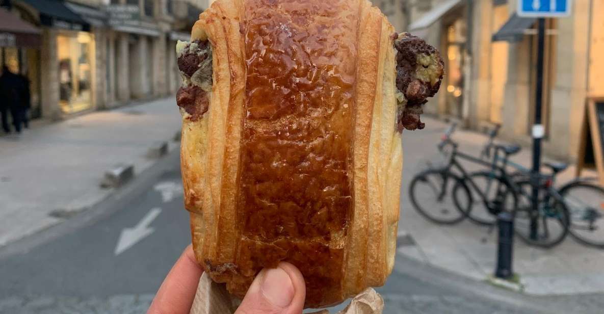 Paris: Montmartre Chocolate & Patisseries Food Tour - Stop at Le Grenier À Pain Abbesses Bodian and Pain Pain