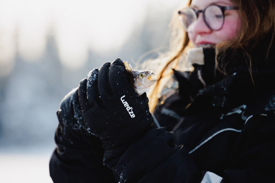 Rovaniemi: Ice Fishing & Snowmobile Safari Combo Day - Warming Up by the Bonfire