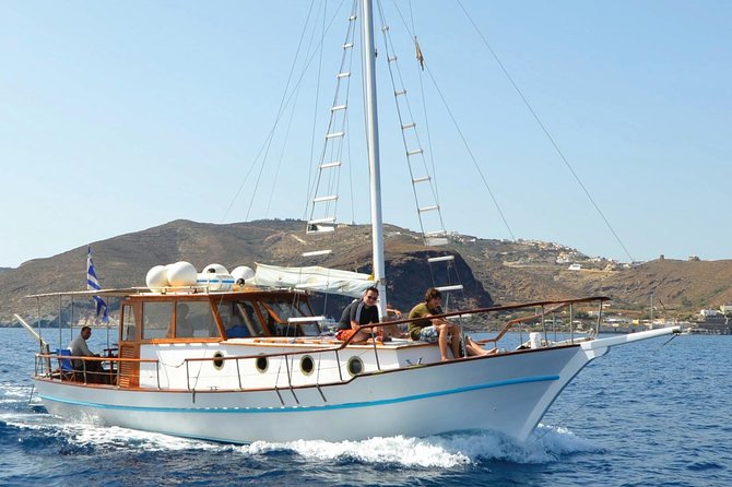 Santorini Caldera Sunset Traditional Cruise With Meal and Drinks - Booking and Additional Information