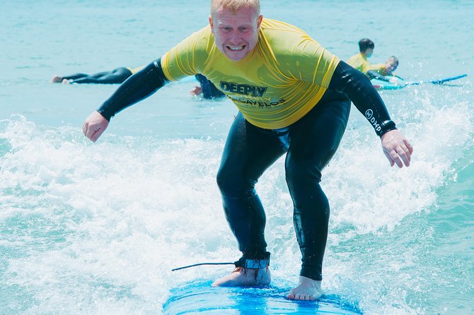 Surf Lesson on Praia De Carcavelos - Revitalizing on Sun Loungers