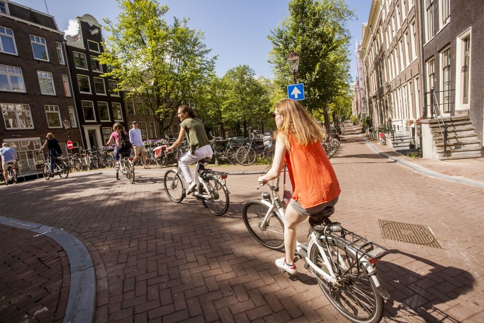 Amsterdam: Hidden Gems & Highlights Guided Bike Tour - Exploring Jordaan District