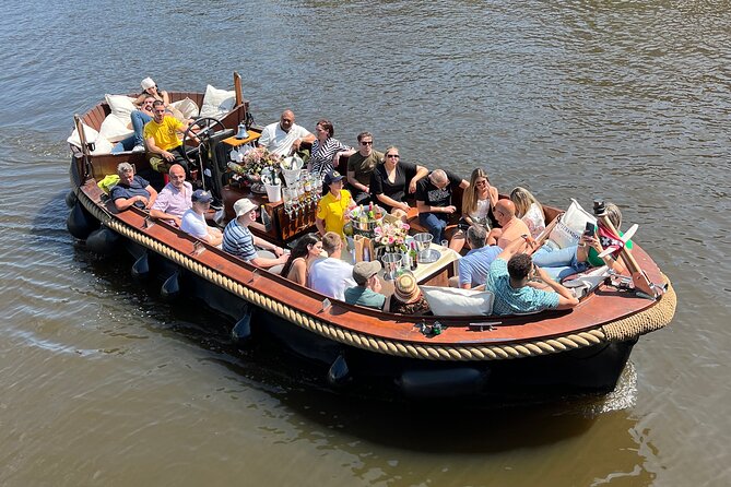 Amsterdam Luxury Boutique Boat Tour With Unlimited Beer and Wine - Explore Amsterdams Canals