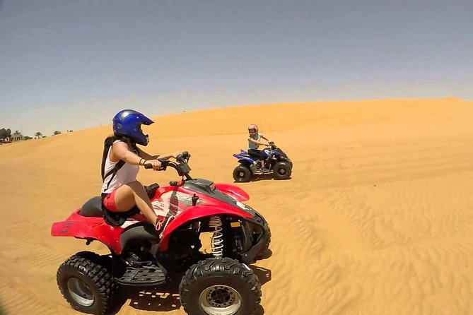 Desert Safari With Quad Bike and Arabian Show With BBQ Dinner - Captivating Evening Entertainment