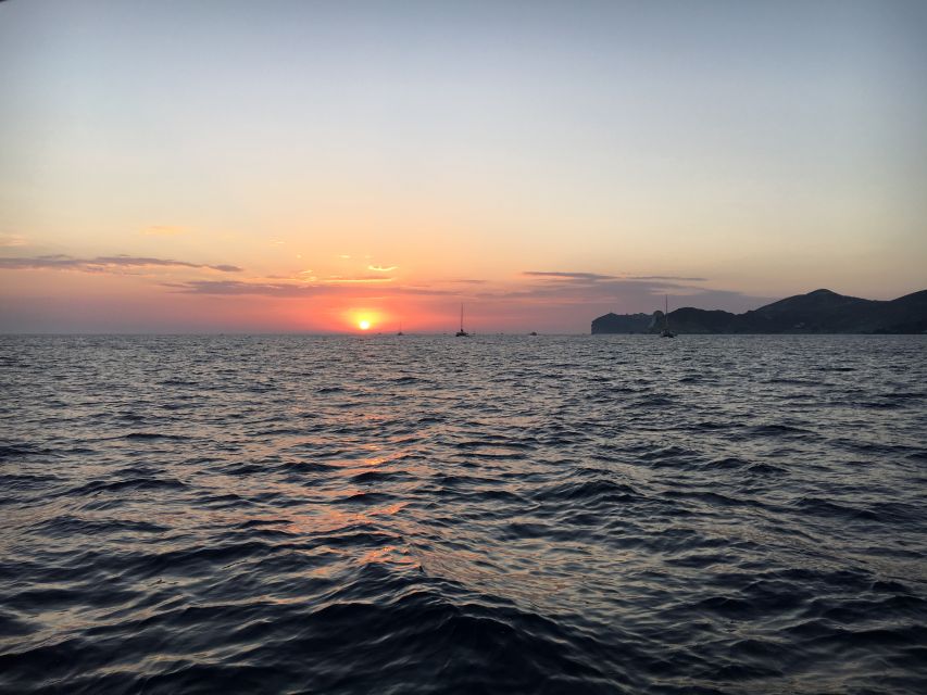 Fira: Private Sunset Cruise With Bbq, Drinks and Hot Springs - Swim and Snorkel Experience