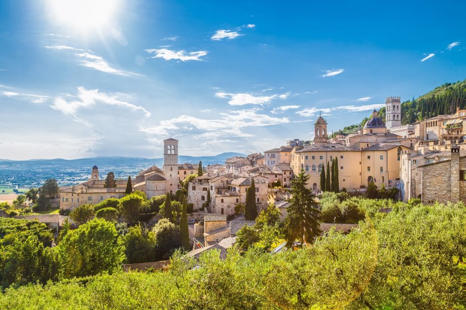 From Florence: Private Day Trip to Assisi and Cortona - Cancellation Policy and Inclusions