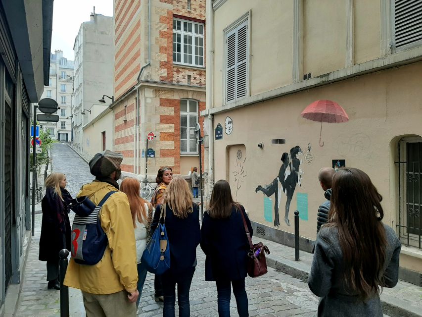 Paris: Montmartre Street Art Tour With an Artist - Experiencing Montmartres Unique Atmosphere