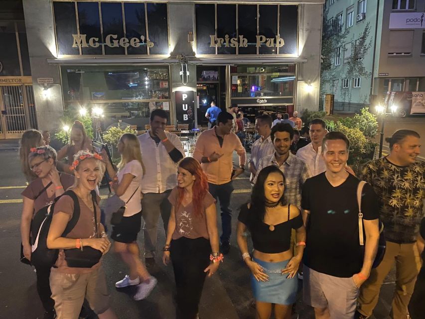 Zurich: Pub Crawl Nightlife Tour With Shots and Snacks - Languages and Group Size