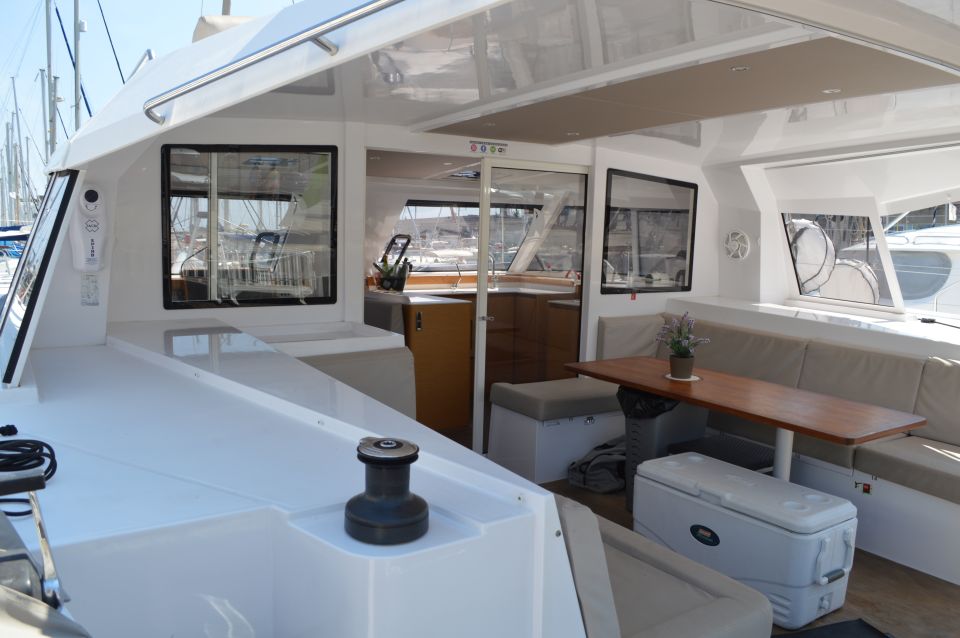 Barcelona: Private Catamaran Sailing With Drinks and Snacks - Passenger Capacity and Duration