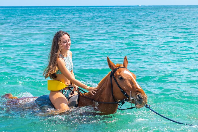 Catamaran Cruise, Snorkel, ATV, Horseback Ride and Swim - Mountain to Sea Horseback Ride