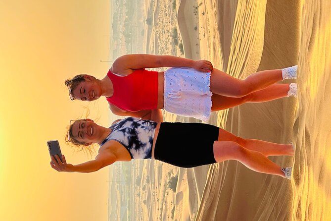 Dubai Sunset Red Dune Desert Safari, Sandboarding and Camel Ride - English-Speaking Professional Guide